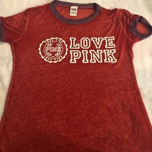 A sheer Pink Brand shirt.